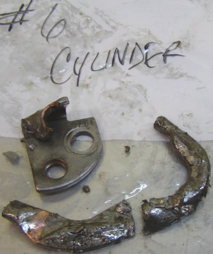 Rod Bearing Failure failed piston cooler | Highway & Heavy Parts